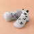Zapatillas ergonómicas Zapamedia con diseño de panda, suela flexible y material liviano, ideales para primeros pasos de niños y niñas.
