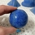 Transform your space with the serene beauty of our Blue Quartz Sphere. Its captivating resemblance to a blue planet brings a sense of calm and balance to any room. Perfect for promoting clear communication and tranquility, it's an ideal addition to both h