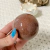 Experience the Red Quartz Sphere - a captivating piece that embodies passion and spiritual connection. Crafted with precision, this sphere offers profound metaphysical benefits, making it ideal for meditation and emotional balance.