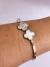 Bracelete Trevo na internet