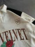 Polo Boxy FiT "Red Velvet" Crema - Moscú Showroom