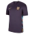 England Away 2024/2025 Nike jersey in blue and purple with a crest and vibrant side patterns.