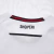 Detail of the back collar of the Albania Away 2025/2026 jersey featuring the word "SHQIPËRI" in black on a white background.