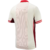 Back view of the Canada Away 2023/2024 white soccer jersey by Nike for men, featuring red stripes and a modern design.