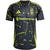 Columbus Crew 2025 Away Jersey in black and green, featuring a vibrant splatter design and Adidas branding.