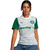 Woman wearing the Palmeiras Home 2025 Jersey by Puma in white with green sleeves, featuring the club logo and sponsorship.