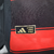 Close-up of the Adidas label on the Flamengo Home 2025 Jersey, indicating it as an authentic licensed product.