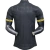 Back view of the México Home 2025 Jersey by Adidas, featuring a black design with gold accents on the sleeves.