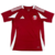 Red and white Qatar Home 2025 jersey for men, featuring a v-neck design and Adidas branding.