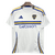 Frente de la Camiseta Boca Juniors Away 24/25 Blanca y Azul Torcedor Masculina Adidas: Camiseta blanca con detalles azules, escudo del Boca Juniors en el pecho y logotipo de Adidas. Diseño elegante y transpirable, ideal para los aficionados que desean apo