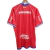 Back view of the Nacional Reversible 2025 Jersey in red with the name "SARUBBI" and branding details.