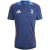 Juventus 2024/2025 training jersey for men in blue with orange accents, featuring Adidas branding and the Juventus logo.