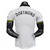 Back view of the Borussia Dortmund Third 2024/2025 jersey in white and black, featuring the name 'DORTMUND' on the upper back.