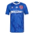 Adidas blue home jersey for Universidad Chile 2024/2025, featuring club logo and sponsor branding.
