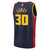 Camiseta de baloncesto azul de los Golden State Warriors, con el nombre "CURRY" y el número 30 en la parte posterior.