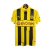 Camisa retrô do Borussia Dortmund, amarela e preta, com logo da Puma e estampas da marca e patrocinador.