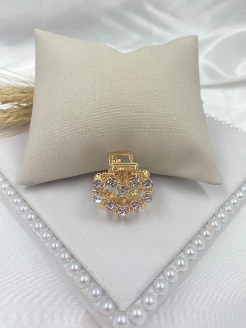 Presilha dourada com strass