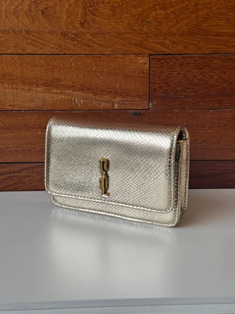 BOLSA DOURADA E ALÇA COURO.