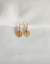 Brinco Argolinha Travel World - Banhada a ouro 18k - loja online