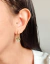 Brinco Argolinha Travel World - Banhada a ouro 18k na internet