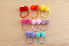 Elásticos: dois pompons - comprar online