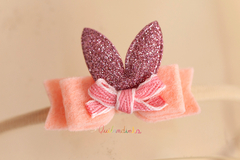 Faixa: Orelhinhas Pêssego com rosa