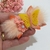 Laço G Flores no Jardim - comprar online