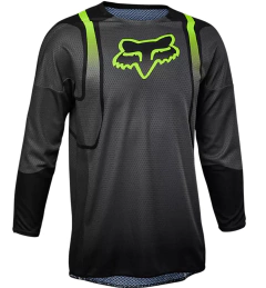 Jersey de motocross Fox Racing en negro con detalles en verde y mangas largas, ideal para alto rendimiento.
