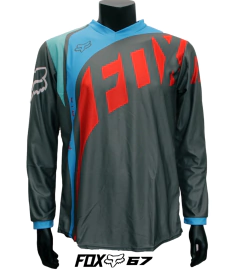 Jersey FOX 360 en tonos gris, rojo y azul, con logo FOX en diagonal y diseño moderno para motocross o enduro