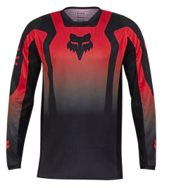Jersey Fox 180 Lean en color rojo diseñado para motocross y enduro, con tejido transpirable y ajuste ergonómico.