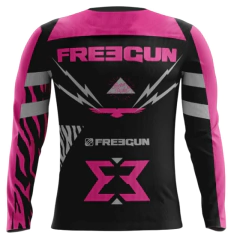 Jersey de motocross Freegun en negro y rosa con diseño deportivo y estampado llamativo