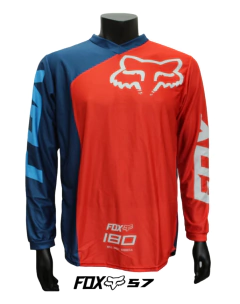 Jersey FOX 180  en color rojo con detalles azul y blanco, ideal para motocross y BMX, exhibido en maniquí negro.