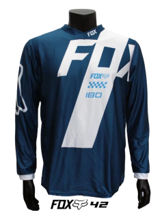 Jersey FOX 180 de motocross para hombre en color azul con detalles blancos.

