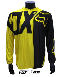 Jersey FOX 360 de manga larga en colores amarillo y negro con diseño dividido y logotipo FOX en el pecho. Ideal para motocross, BMX y deportes extremos, con estilo agresivo y llamativo.