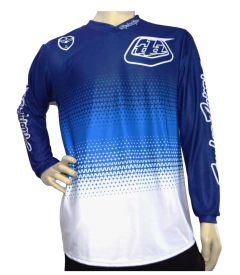 Jersey Troy Lee Designs  en color azul y blanco degradado, ideal para BMX y motocross. Diseño ligero, transpirable y resistente.