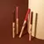CONTORNO LABIAL RETRÁTIL CHOCO FUN – BOMBOM na internet