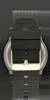 Vista trasera del reloj para caballero Reebok en color negro con detalles en gris.