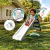 Tobogán infantil plegable acuático de plástico, 3 niveles, colores blanco, rosa y celeste, apto para interior o exterior. Puede utilizarse con agua para deslizarse.