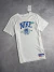 Camiseta Nike Champions of Sport (branca) - comprar online