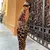 Vestido Onça Aberto nas Costas na internet