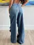 Calça Jeans Trançada na internet