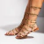 Emma - Sandália Rasteira Feminina Gladiadora Tachas Aplicação Dourado - comprar online