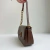 Suíça - Bolsa Feminina Média Tiracolo Corrente Marrom - Not-Me Shoes - Fábrica Própria de Calçados Femininos