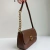 Suíça - Bolsa Feminina Média Tiracolo Corrente Marrom na internet