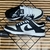 Dunk Low - Preto/Branco (Panda)