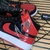 Jordan Mid 1 - Preto/Vermelho na internet