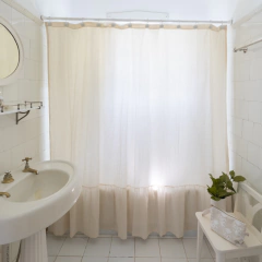 Cortina de baño con volado