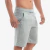 Bermuda de moletom preta, com elástico na cintura e cordão, modelo masculino.