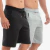 Kit com duas bermudas de moletom, uma preta e outra cinza, modelagem confortável para uso casual.