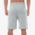 Bermuda moletom masculina cinza vista de trás, destacando o design e o ajuste confortáveis.